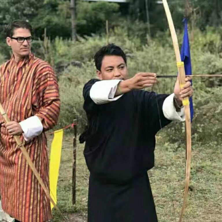 Bhutanese man playing archery